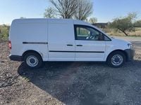 Second-hand VW Caddy Maxi 102 CP (75 kW) 2012 Alb Monovolum