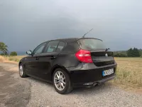 Gebraucht BMW 116 Lifestyle 122 PS (89 kW) 2011 Schwarz Kleinwagen