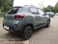 Gebraucht Dacia Spring Extreme 47 kW (65 PS) 2023 Grün "flechtengrau" Kleinwagen
