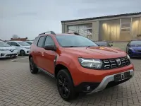 Używany Dacia Duster Extreme 150 KM (110 kW) 2022 Pomarańczowy SUV