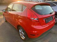 Gebraucht Ford Fiesta Titanium 82 PS (60 kW) 2011 Coloradorot Kleinwagen