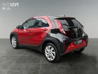 Gebraucht Toyota Aygo X Comfort 72 PS (52 kW) 2022 Chili red perleffekt/ night sky black SUV