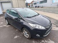 Gebraucht Ford Fiesta Titanium 95 PS (69 kW) 2011 Pantherschwarz metallic Kleinwagen