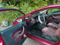 Gebraucht Ford Fiesta 82 PS (60 kW) 2009 Rot Kleinwagen