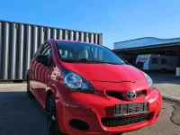 Gebraucht Toyota Aygo 68 PS (50 kW) 2010 Rot Kleinwagen