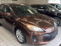 Używany Mazda 3 Edition 105 KM (77 kW) 2012 Brązowy Sedan/Limuzyna