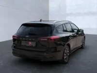 Gebraucht Ford Focus Titanium 125 PS (91 kW) 2024 Obsidianschwarz (metallic) Kombi