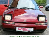 Gebraucht Mazda 323 88 PS (64 kW) 1994 Rot Limousine