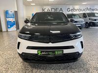 Gebraucht Opel Mokka 131 PS (96 kW) 2021 Jade weiss/arktis weiss (metallic) SUV
