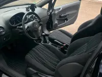 Używany Opel Corsa Edition 87 KM (63 kW) 2010 Czarny Hatchback