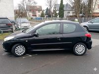 Gebraucht Peugeot 206+ 73 PS (53 kW) 2011 Schwarz Kleinwagen