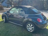 Gebraucht VW New Beetle Freestyle 105 PS (77 kW) 2010 Schwarz Kleinwagen