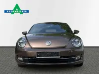 Używany VW Beetle Cabriolet Design 105 KM (77 kW) 2013 Brązowy Kabriolet