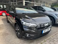 Neu Dacia Sandero Journey 91 PS (66 kW) 2025 Schwarz Limousine