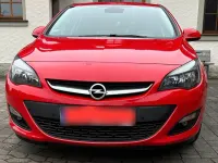 Używany Opel Astra 120 KM (88 kW) 2015 Czerwony Sedan/Limuzyna