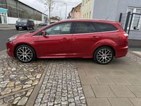 Gebraucht Ford Focus Titanium 125 PS (91 kW) 2013 Candyrot metallic Kombi