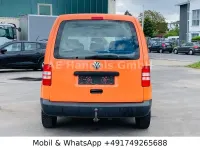 Używany VW Caddy 102 KM (75 kW) 2011 Pomarańczowy Minivan