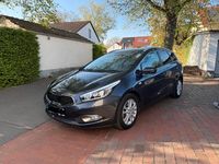 Używany Kia Ceed 100 KM (73 kW) 2014 Szary Hatchback
