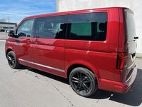 Second-hand VW Multivan 204 CP (150 kW) 2024 Roșu Monovolum