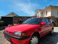 Gebraucht Mazda 323 88 PS (64 kW) 1992 Rot Kleinwagen
