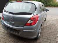 Usado Opel Corsa 80 HP (58 kW) 2007 Cinzento Sedan