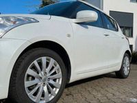 Gebraucht Suzuki Swift X-TRA 94 PS (69 kW) 2013 Weiß Kleinwagen