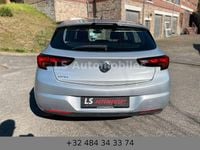 Second-hand Opel Astra 101 CP (74 kW) 2016 Argintiu Berlinǎ