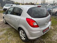 Second-hand Opel Corsa Active 95 CP (69 kW) 2013 Argintiu Berlinǎ