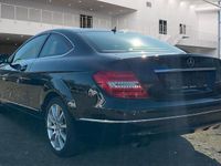 Gebraucht Mercedes C180 156 PS (114 kW) 2011 Obsidianschwarz Coupé