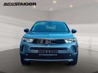 Gebraucht Opel Mokka Elegance 131 PS (96 kW) 2023 Kontrast grau/quarz silber SUV