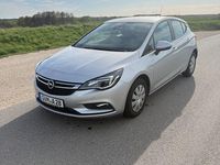Używany Opel Astra Selection 105 KM (77 kW) 2016 Srebrny Sedan/Limuzyna