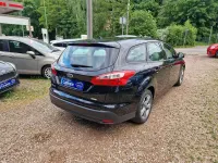 Gebraucht Ford Focus 101 PS (74 kW) 2014 Pantherschwarz metallic Kombi