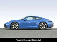 Gebraucht Porsche 911 Carrera 394 PS (289 kW) 2025 Luganoblau Coupé