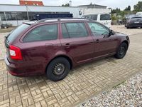 Second-hand Skoda Octavia Impuls Edition 105 CP (77 kW) 2011 Roșu Break