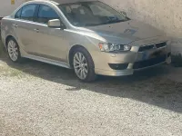 Gebraucht Mitsubishi Lancer 143 PS (105 kW) 2009 Gold Limousine