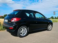 Gebraucht Peugeot 206+ 60 PS (44 kW) 2009 Schwarz Kleinwagen