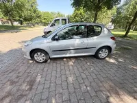 Gebraucht Peugeot 206+ 60 PS (44 kW) 2010 Silber Kleinwagen