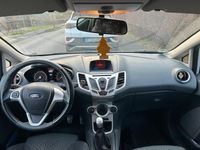 Gebraucht Ford Fiesta 104 PS (76 kW) 2009 Weiß Kleinwagen