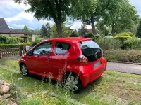 Gebraucht Toyota Aygo 68 PS (50 kW) 2010 Rot Kleinwagen