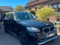 Second-hand BMW X1 148 CP (108 kW) 2011 Negru SUV