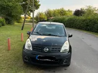 Gebraucht Nissan Pixo 63 PS (46 kW) 2011 Schwarz Kleinwagen