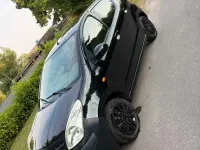 Gebraucht Nissan Pixo 63 PS (46 kW) 2011 Schwarz Kleinwagen