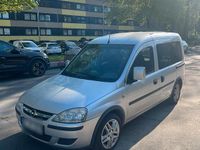 Second-hand Opel Combo 101 CP (74 kW) 2010 Argintiu Monovolum