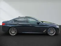 Gebraucht BMW 550 462 PS (339 kW) 2018 Carbonschwarz Limousine