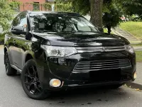 Gebraucht Mitsubishi Outlander P-HEV 121 PS (88 kW) 2014 Schwarz SUV