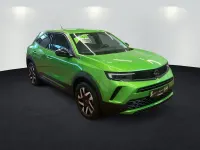 Gebraucht Opel Mokka Elegance 131 PS (96 kW) 2024 Matcha green SUV