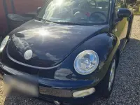 Gebraucht VW New Beetle 85 PS (62 kW) 2000 Schwarz Kleinwagen