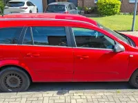 Używany Opel Astra Selection 140 KM (102 kW) 2009 Czerwony Kombi
