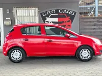 Używany Opel Corsa Selection 69 KM (50 kW) 2010 Czerwony Hatchback