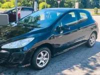 Gebraucht Peugeot 308 98 PS (72 kW) 2010 Schwarz Kleinwagen